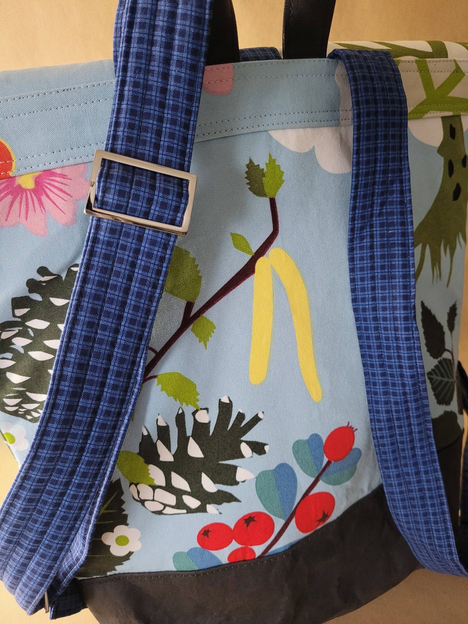 Floral canvas backpack.