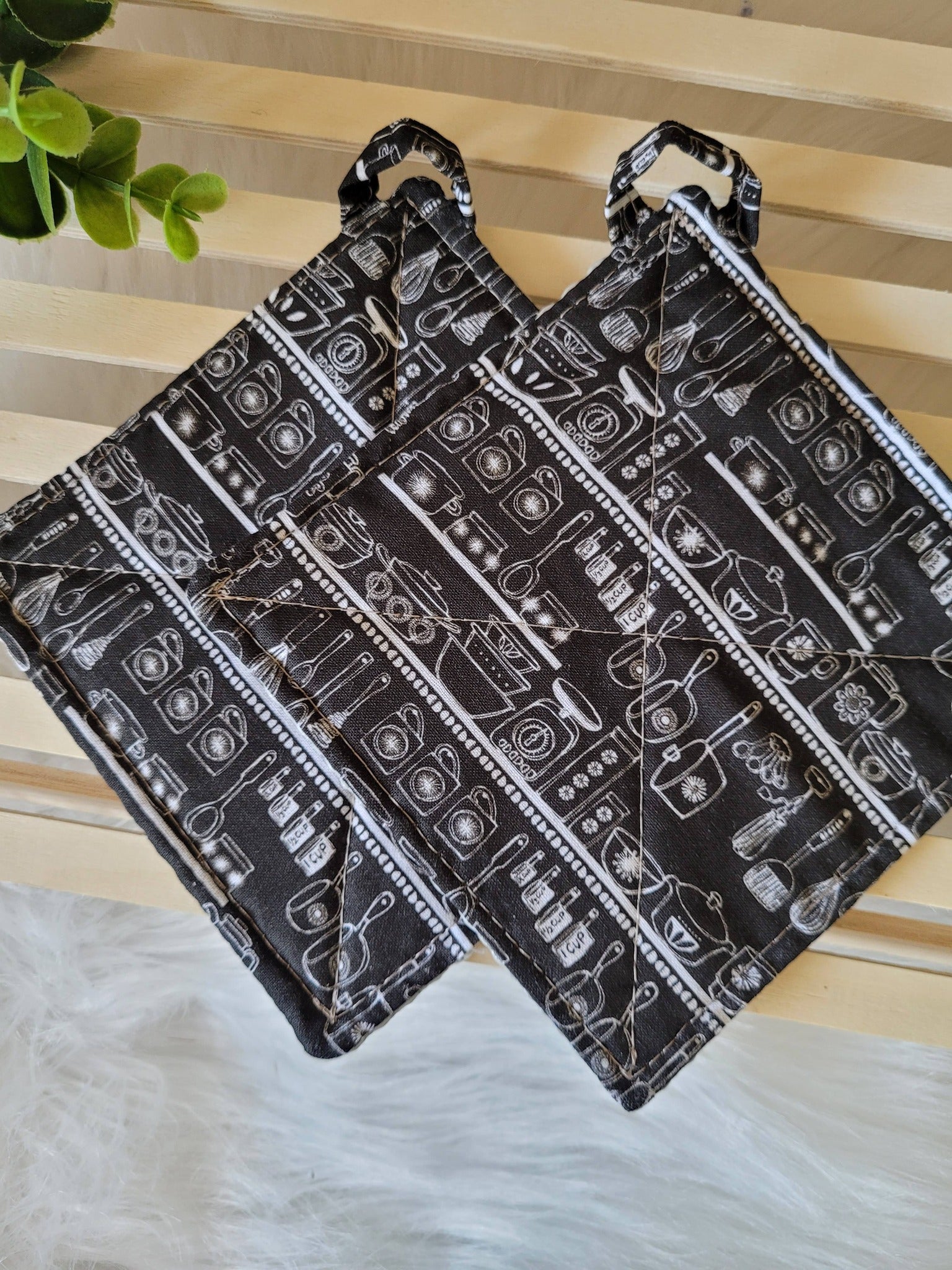 Set of two kitchen cupboard jar grippers